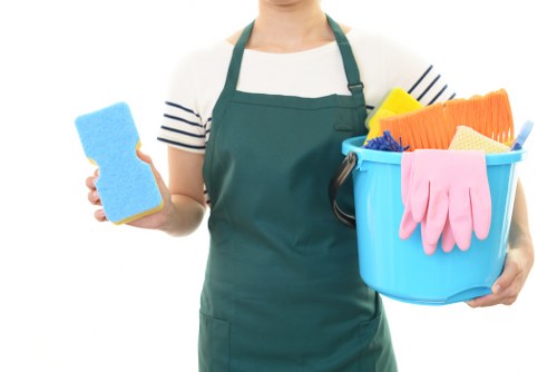 Carpet cleaning team preparing equipment safely