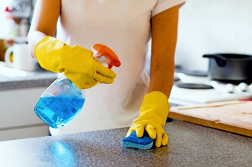 Airbnb cleaner preparing a guest-ready flat in NW2