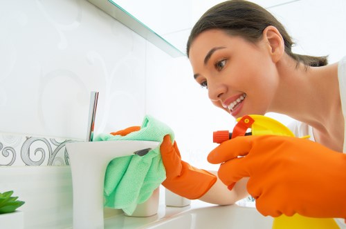 Cleaner checking carpet cleaning equipment and hazards